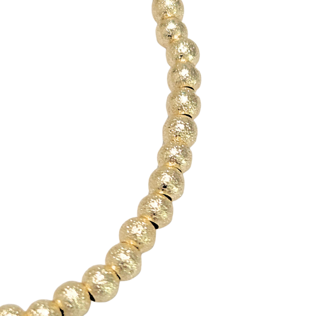 BOLITAS DIAMANTADAS DORADAS | Pulsera elástica - Tamaño Ch/Med | Acero esmaltado - Imagen 2